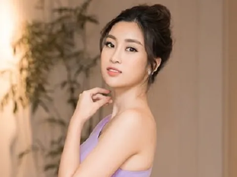 Hoa hậu Đỗ Mỹ Linh gợi cảm với đầm tím hở một bên vai