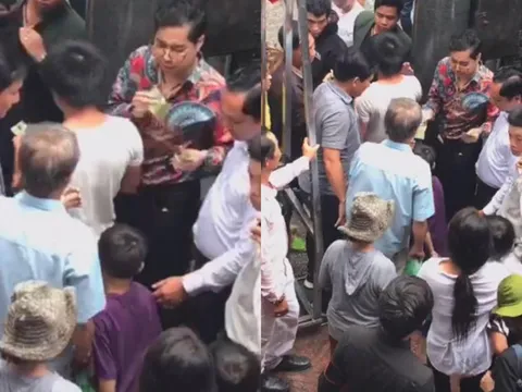 Ngọc Sơn phát 10 tấn gạo và tiền cho người nghèo trong ngày mưa bão