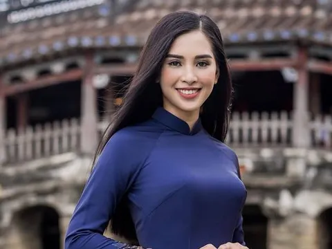 Trần Tiểu Vy từng làm mẫu trong trang phục áo dài do Hoa hậu Ngọc Hân thực hiện