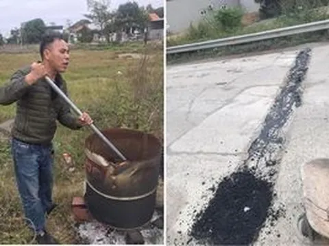 Người đàn ông vá đường giữa trời rét buốt ở Quảng Ninh